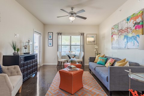 living room with furniture and a ceiling fan  at Legacy Brooks, San Antonio, 78223